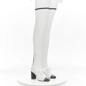 CHANEL 2023 Runway black toe cap white bow CC fishnet thigh high heels EU38.5