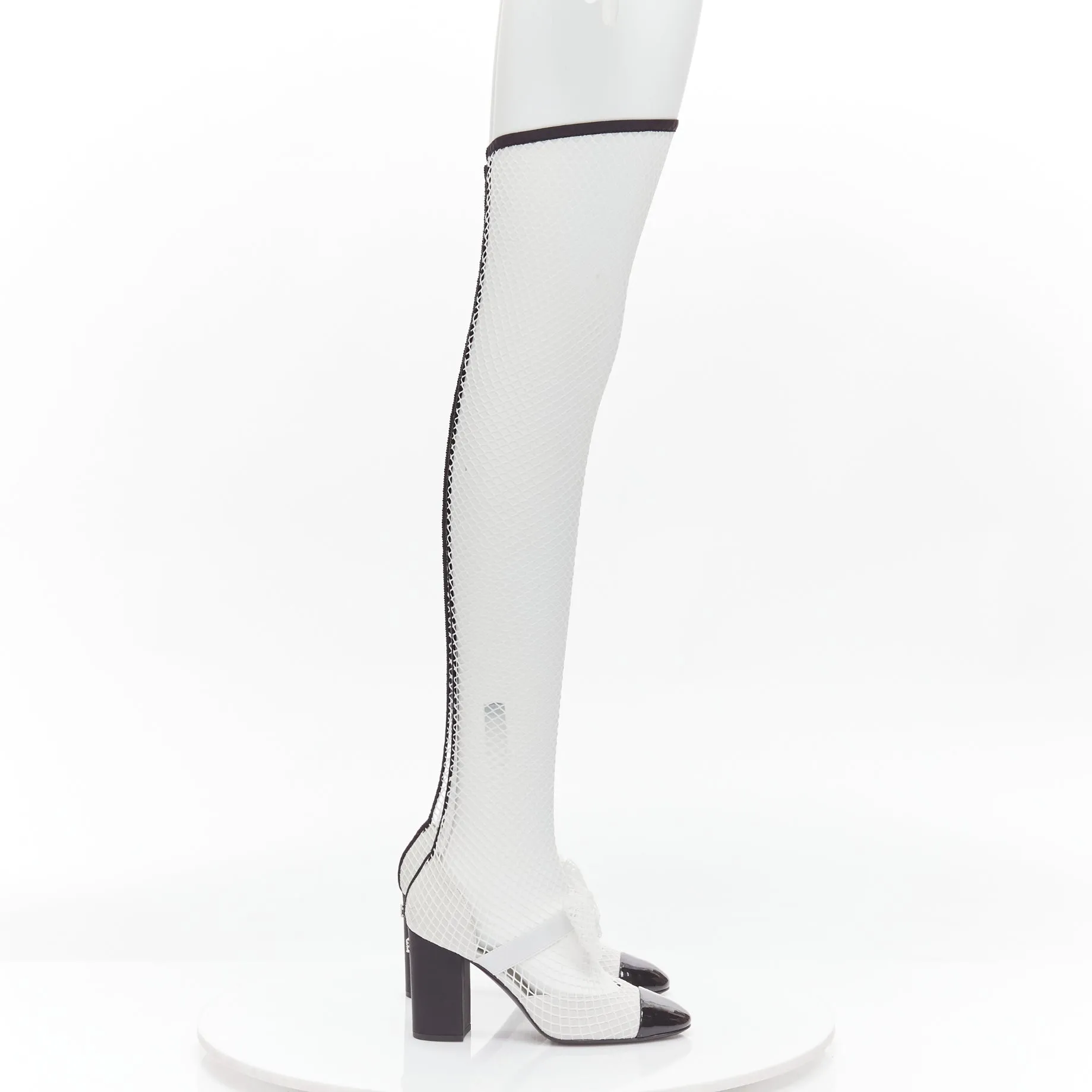 CHANEL 2023 Runway black toe cap white bow CC fishnet thigh high heels EU38.5