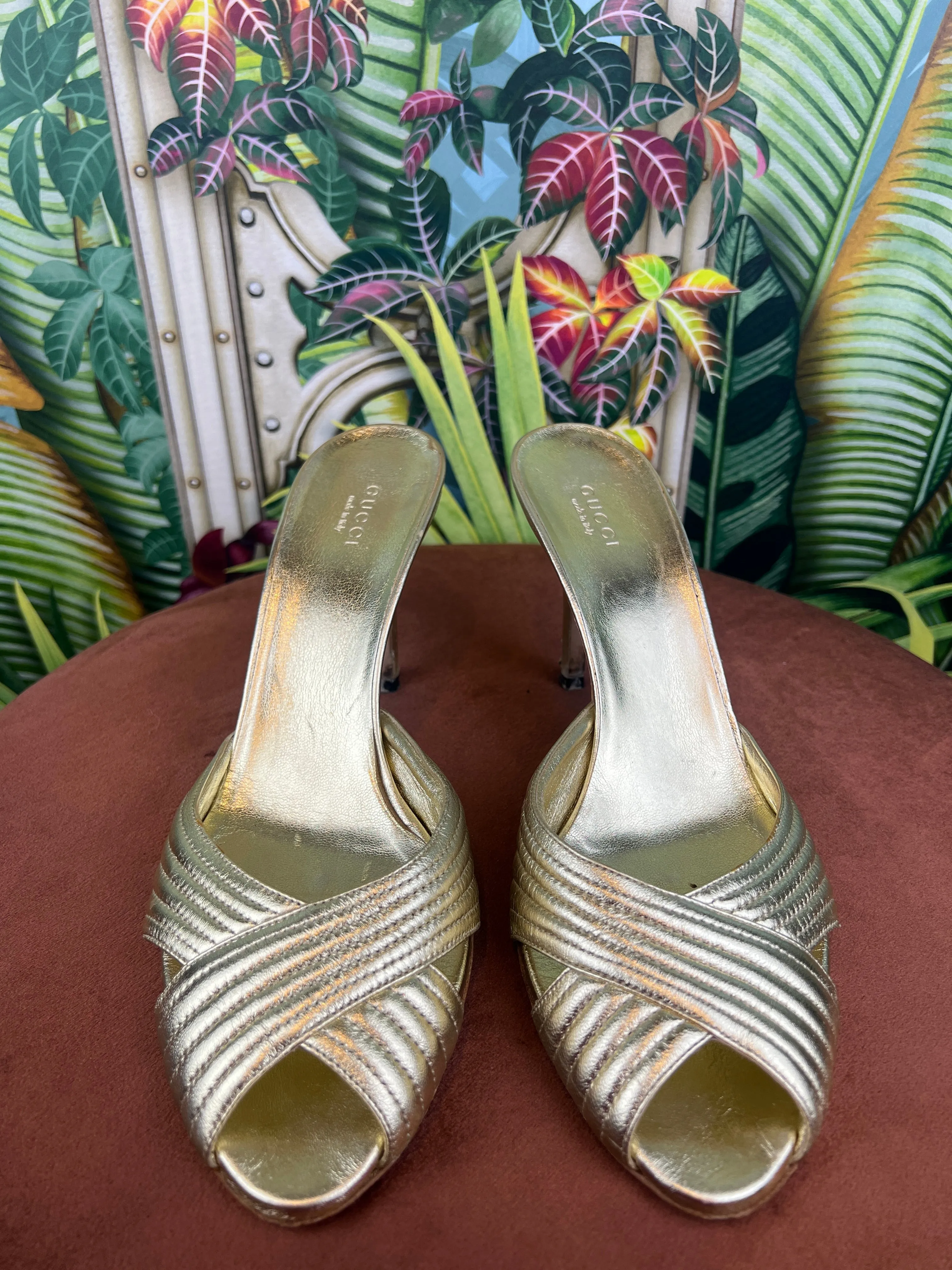 Gucci gold pumps