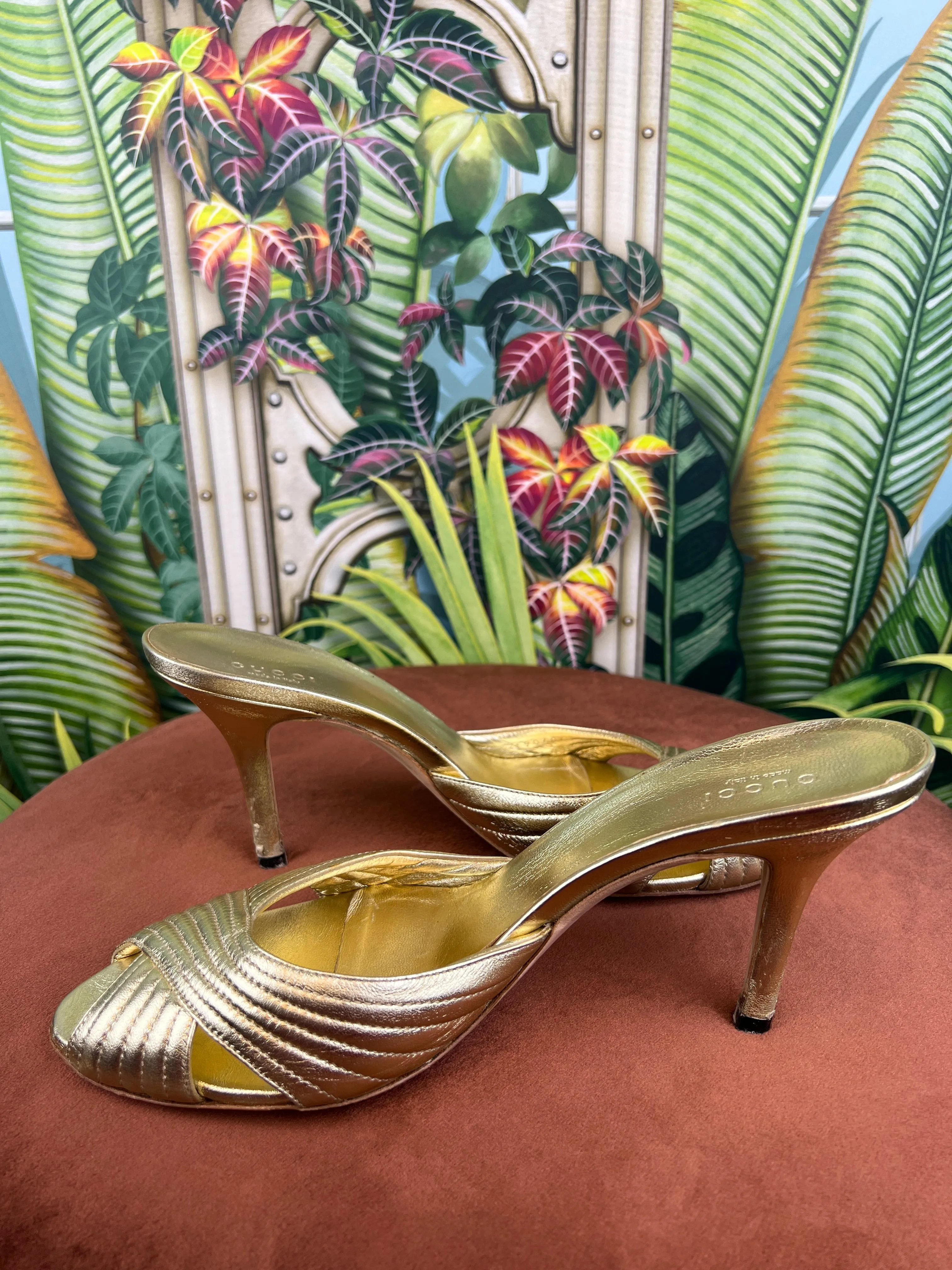 Gucci gold pumps