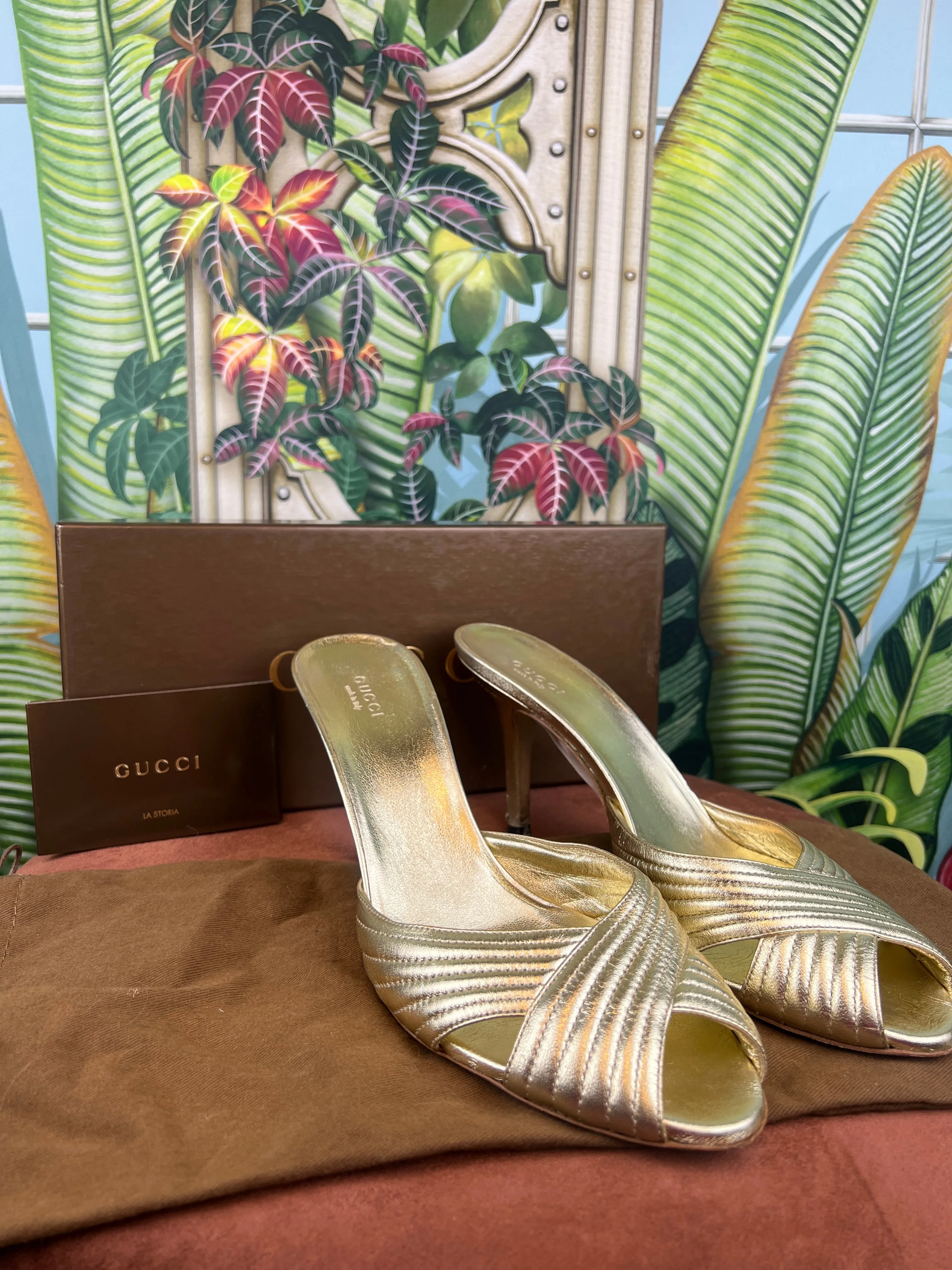 Gucci gold pumps