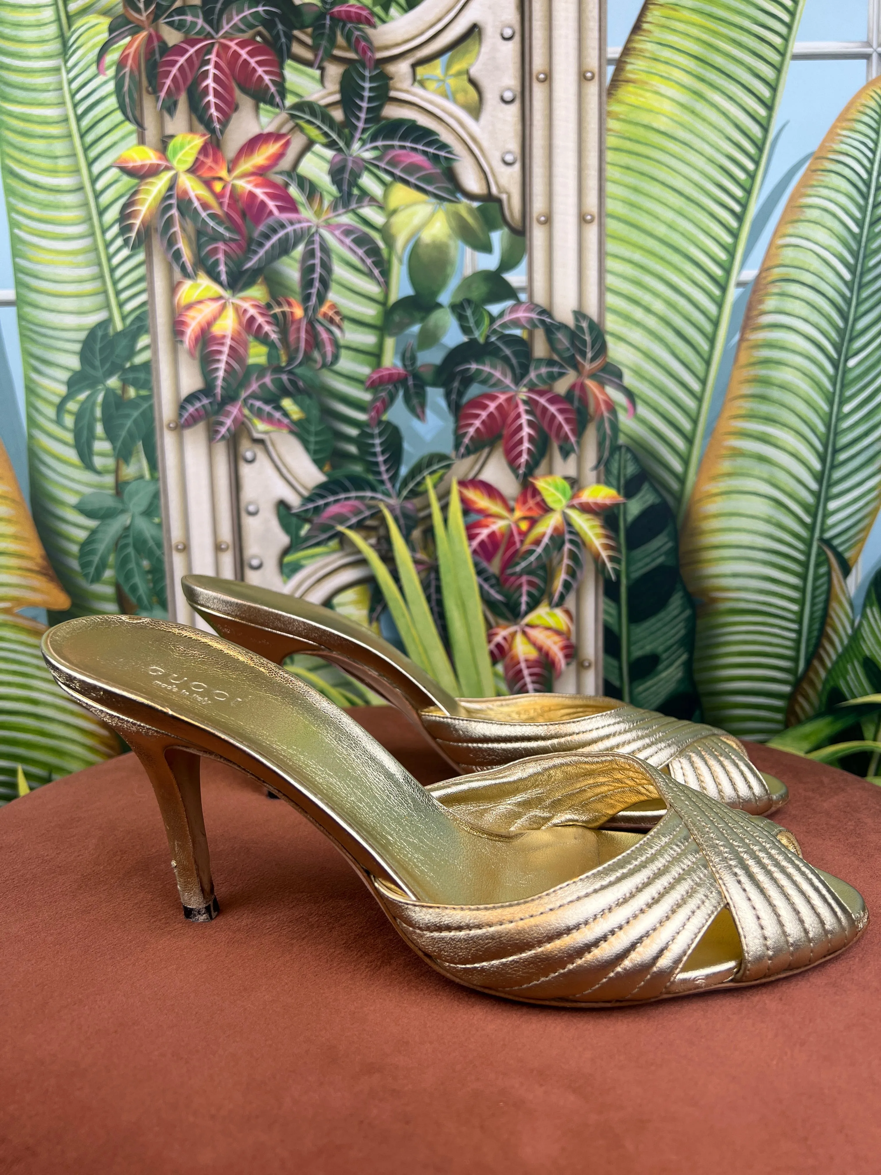 Gucci gold pumps